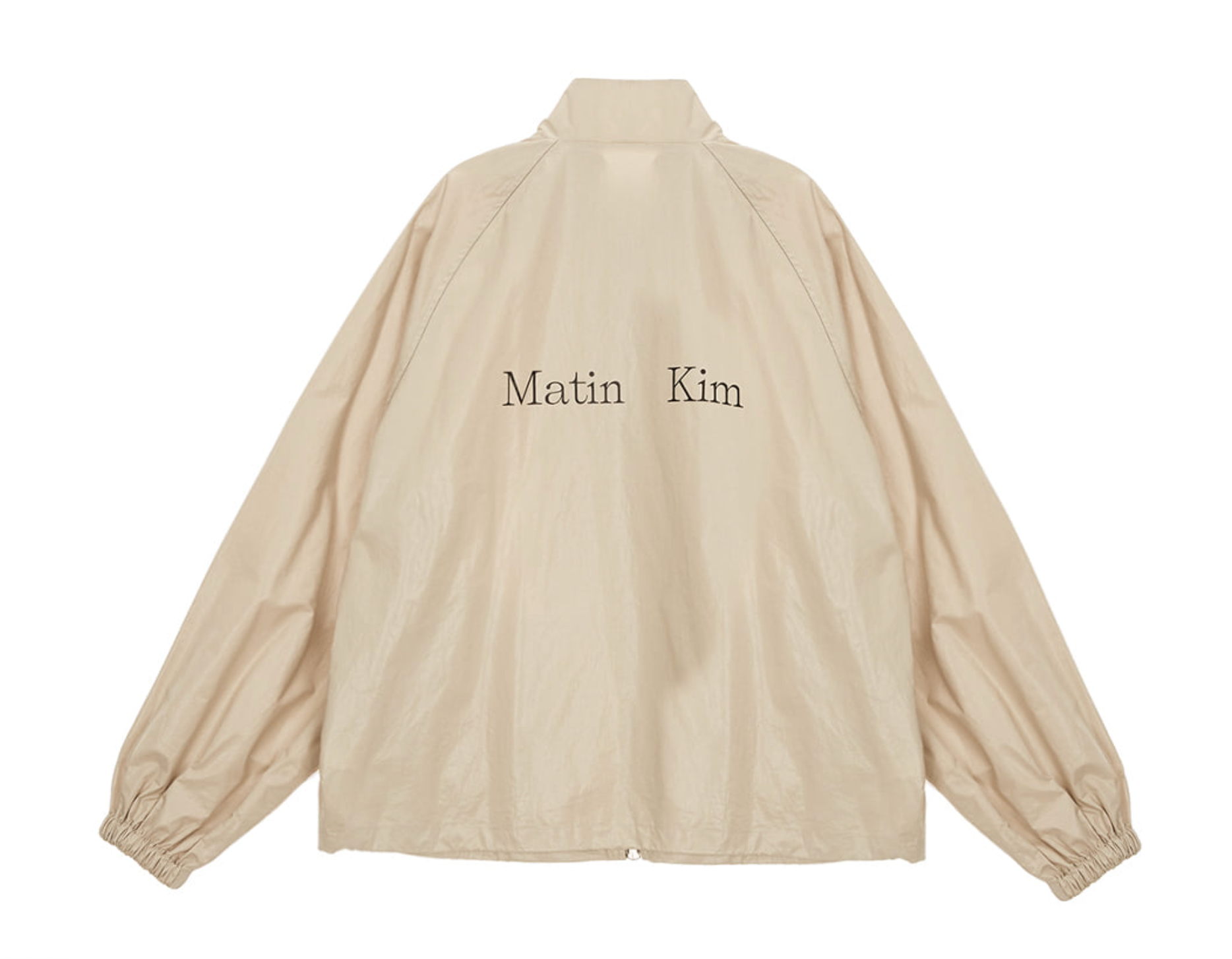 ● MATIN KIM ● LOGO COATING JUMPER Matin Kim Logo Coating Jumper in Beige | Matin Kim | Couturist