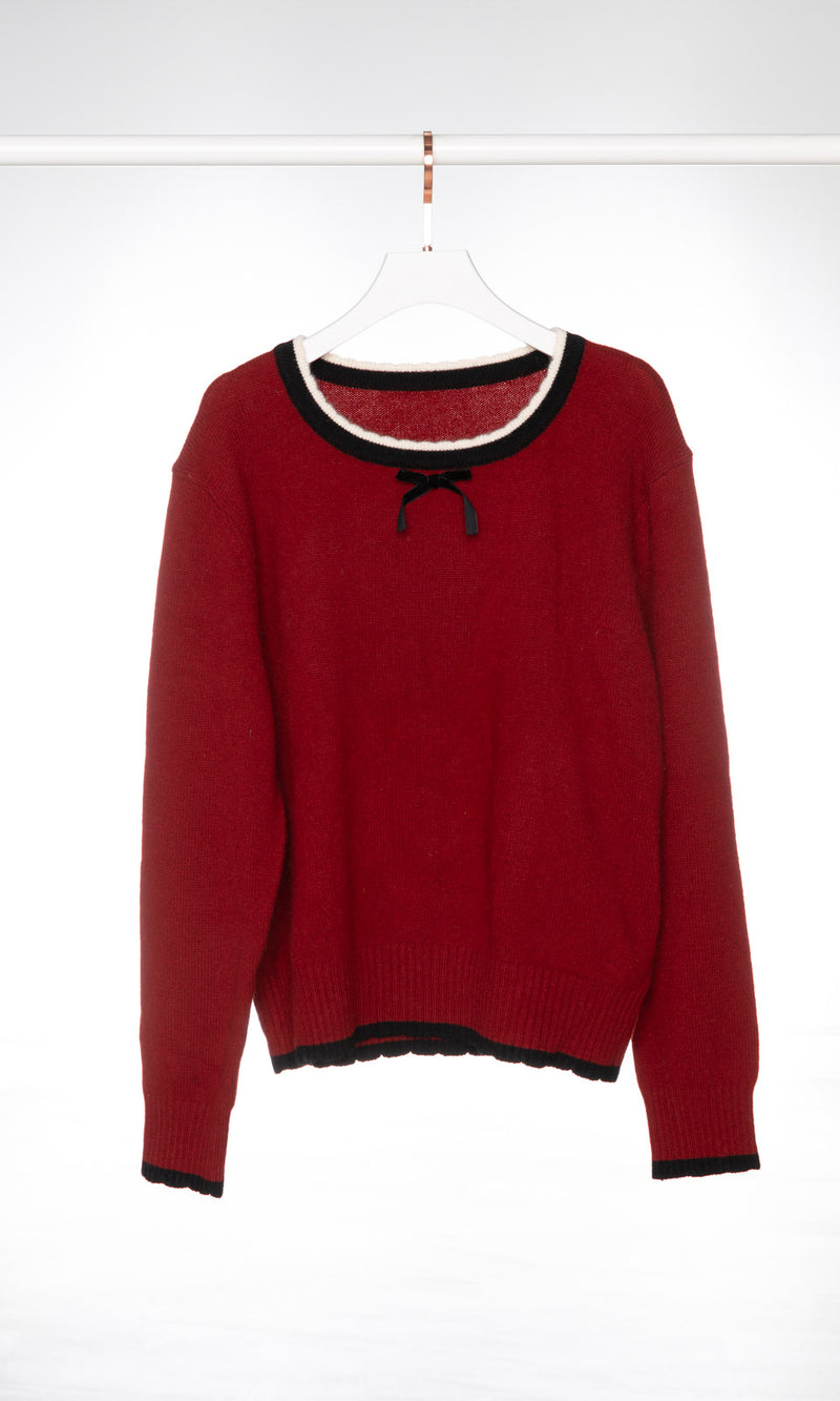 Contrasting Neckline with Black Bow Sweater