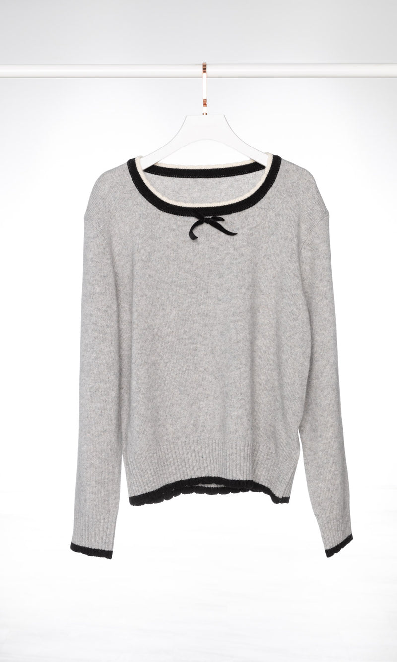 Contrasting Neckline with Black Bow Sweater