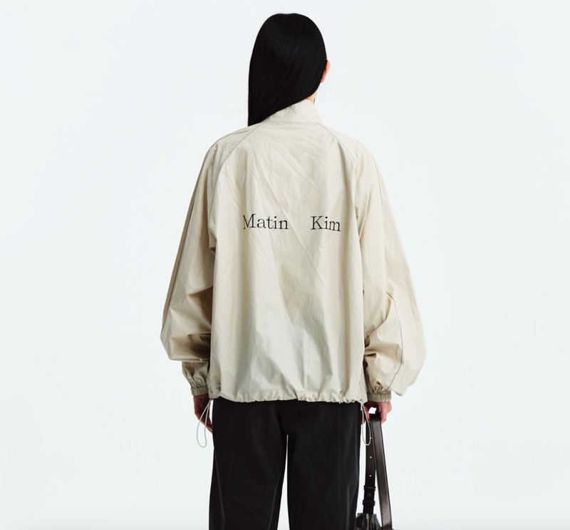 Matin Kim Logo Coating Jumper in Beige